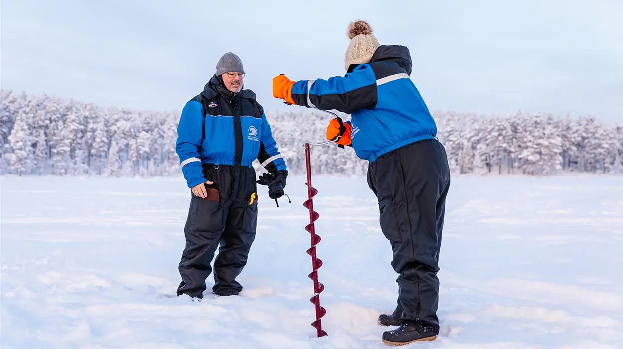 Ice Fishing Trip by Snowmobile Sleigh (Juutua)
