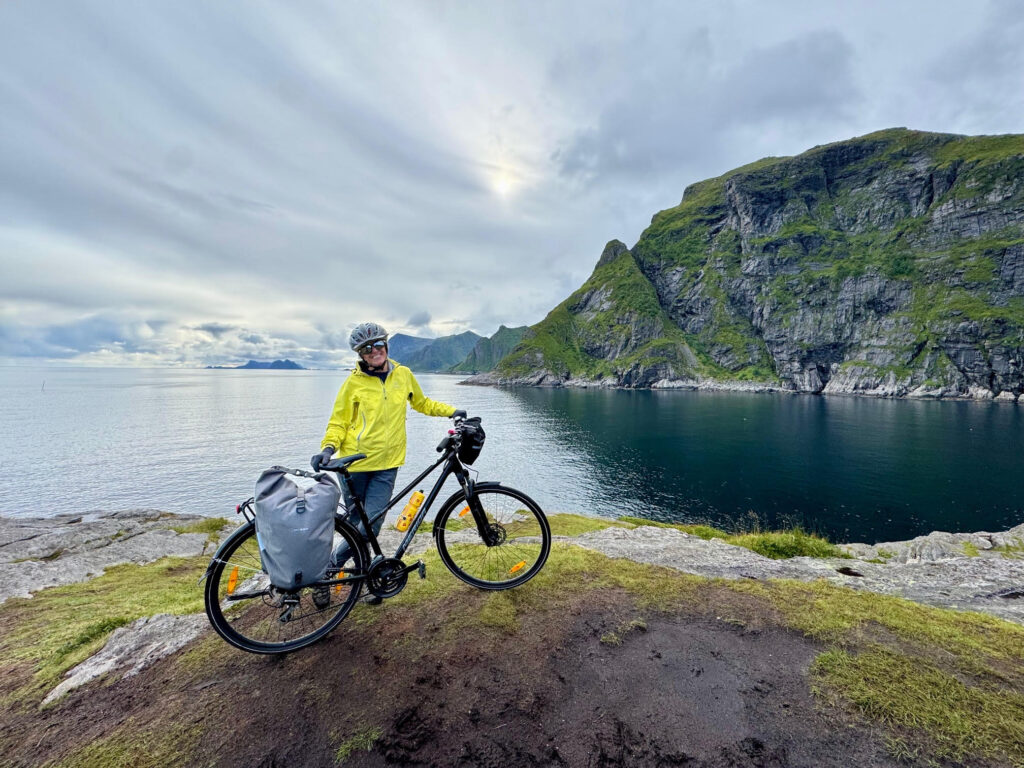 Lady on a solo trip cycling in the Lofoten Islands